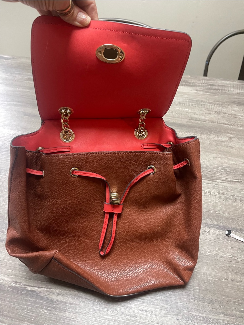 Anne Klein Brown Leather Drawstring Backpack with Red Interior and Gold Hardware